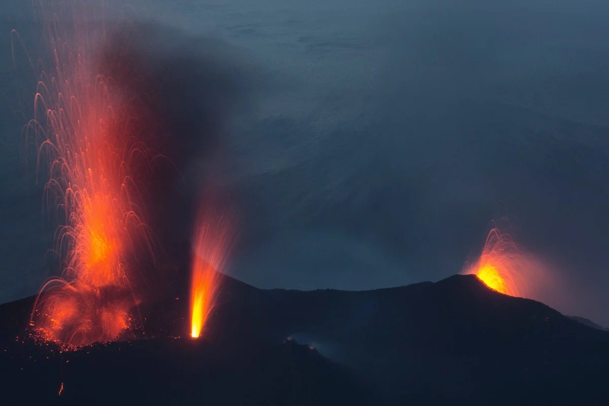 A night explosion at the craters of the Stromboli volcano seen from the Sciara del Fuoco side, Aeolian Islands, Italy